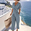 80a2a32b-2dbe-4cfe-aa15-8ccd0b183740.jpg Women's Two Pieces Set Fashion Solid Color Irregular Short Sleeve Suit Summer Fashion V Neck Slim Office Suit Casual Pleated Irregular Top And Pants Female Outfit